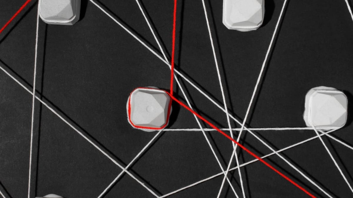 Abstract image of overlapping grid layers slightly out of alignment, representing planning systems operating on different timelines.