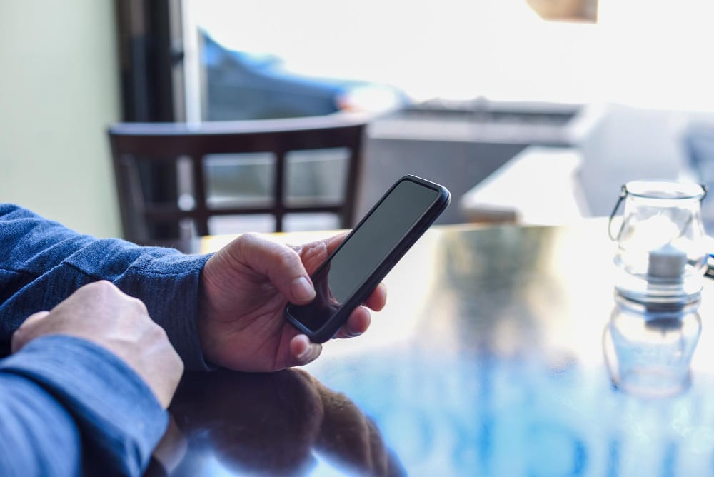 A person scrolling on a phone